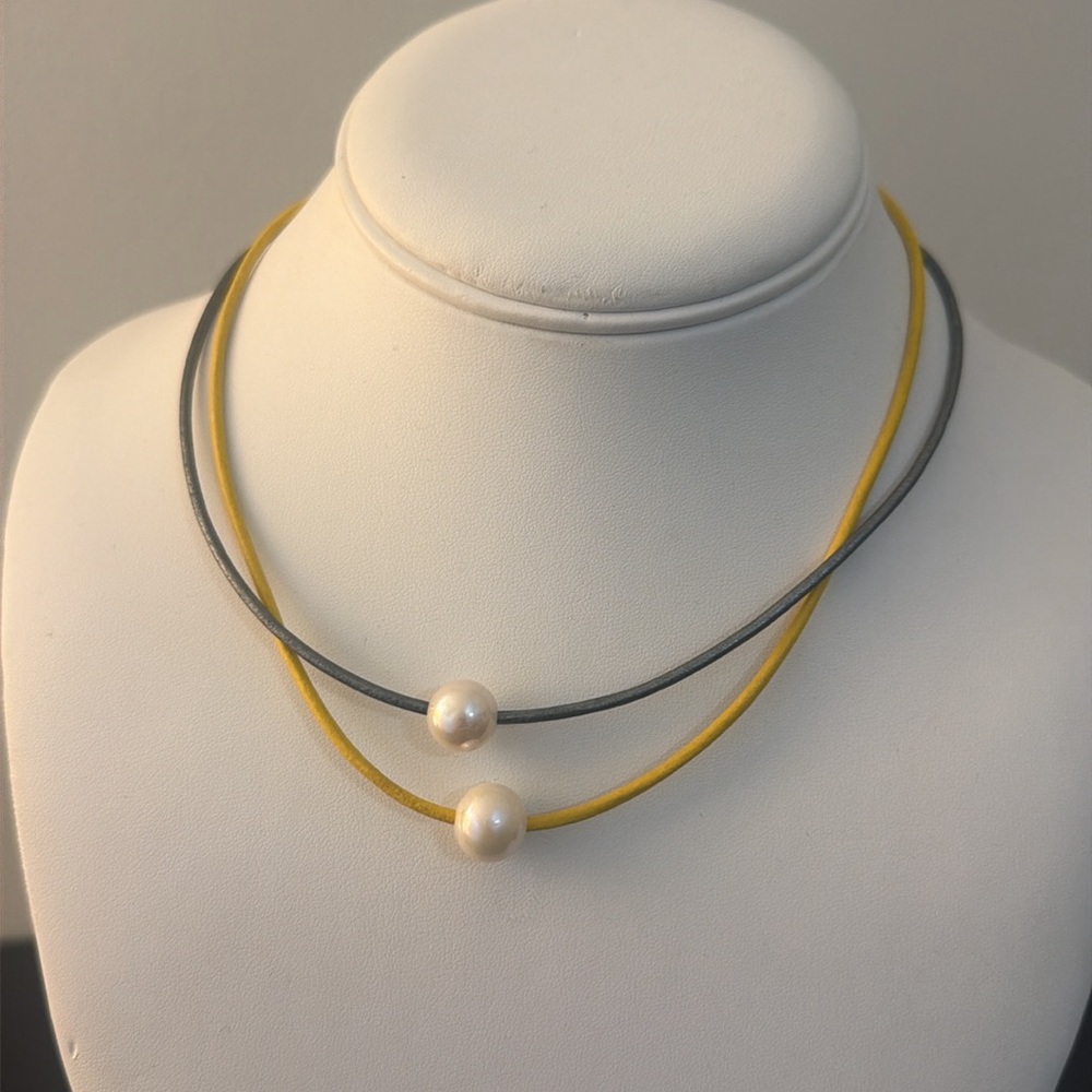 Two Leather Necklaces with Pearl Accents